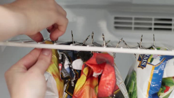 Bender clips being put to use in the freezer for the better sorting of items.