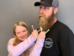 Nick and Bean from Permafrost Beard. Bean is hoping to put glitter in Nick's Facejacket! 