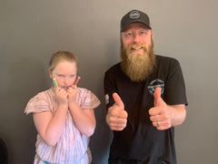 Nick and Bean from Permafrost Beards. Nick gets to keep the glitter out because he raised money for the Food Bank! Charity work in Fairbanks, Alaska