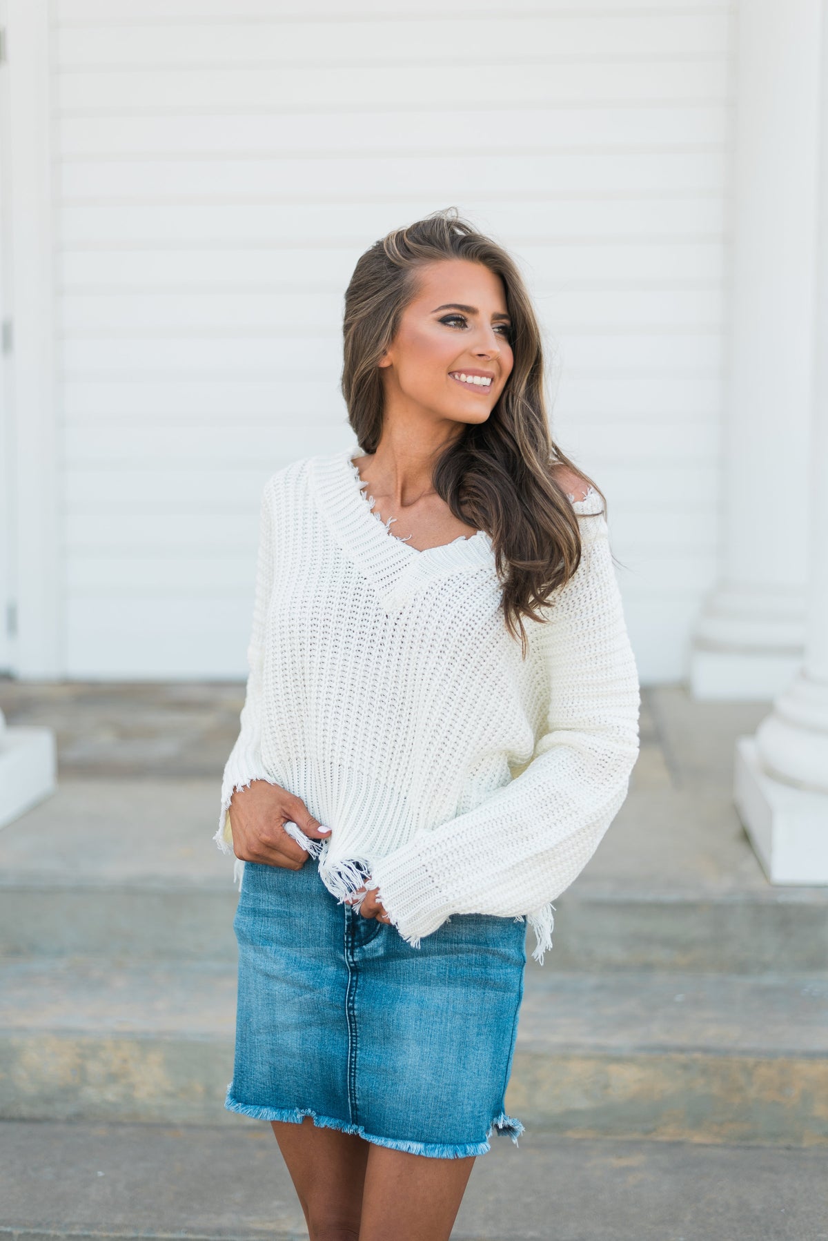 white frayed sweater