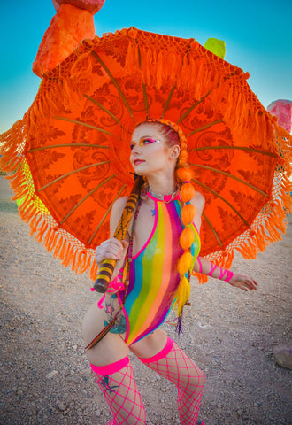 Rainbow Bodysuit and neon pink thigh high fishnets