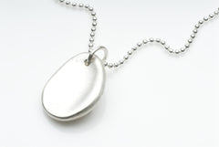 Silver worry stone on choice of chains available on www.wyckoffsmith.com