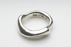 Best selling silver Curved Zen ring is great on its own or stacked in two or three. Designed by Michele Wyckoff Smith and available on www.wyckoffsmith.com