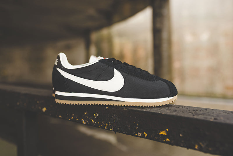 تمايل nike cortez black gum sole 