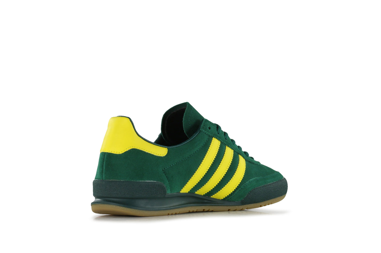 green and yellow adidas jeans