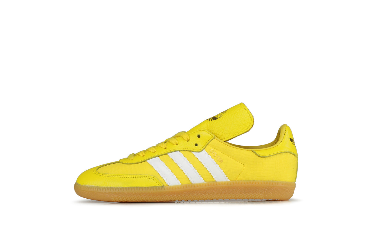 blue and yellow adidas trainers