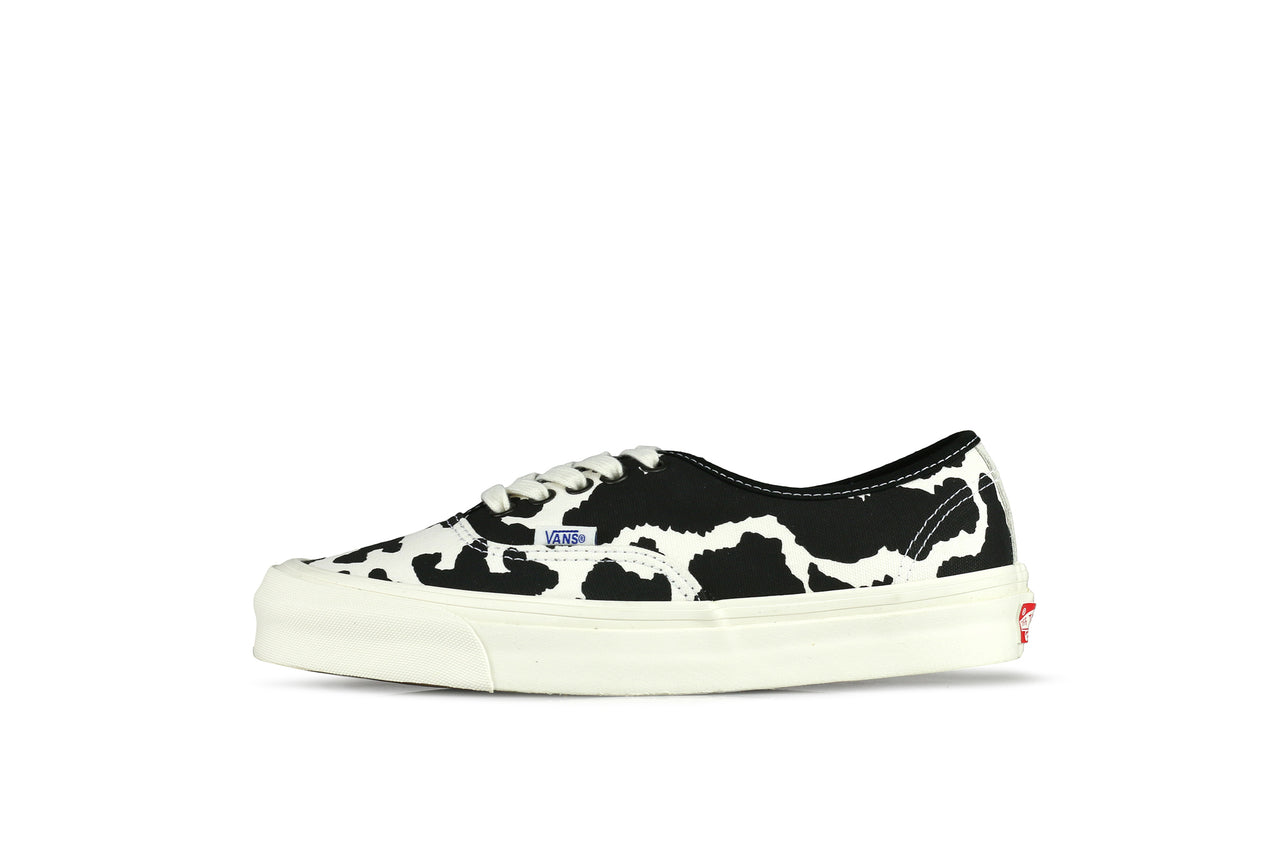 vans cow print slip on