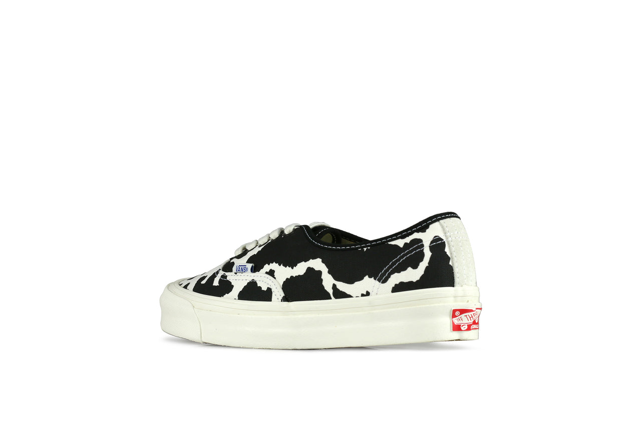 cow print slip on vans