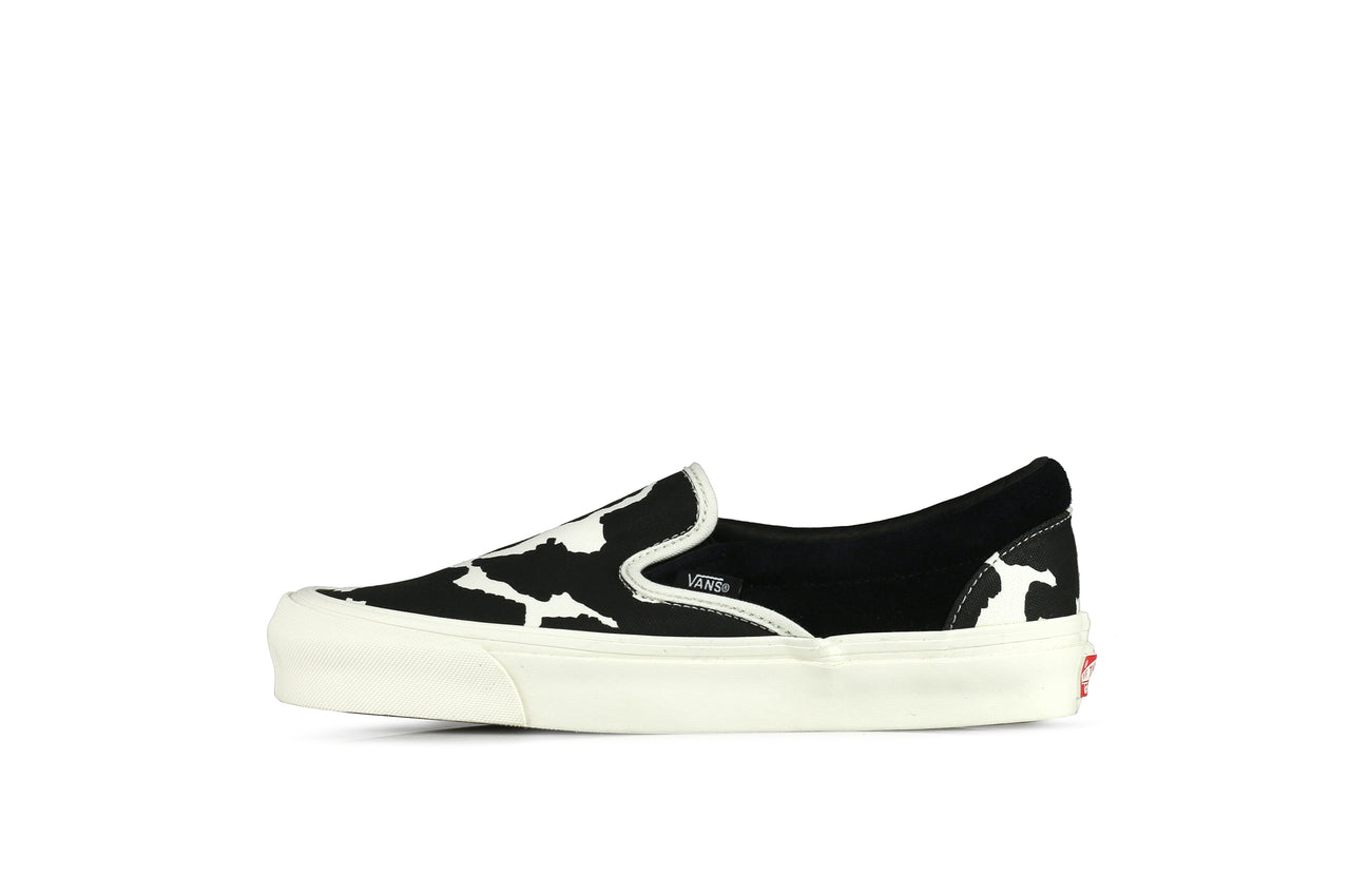 cow print slip on vans