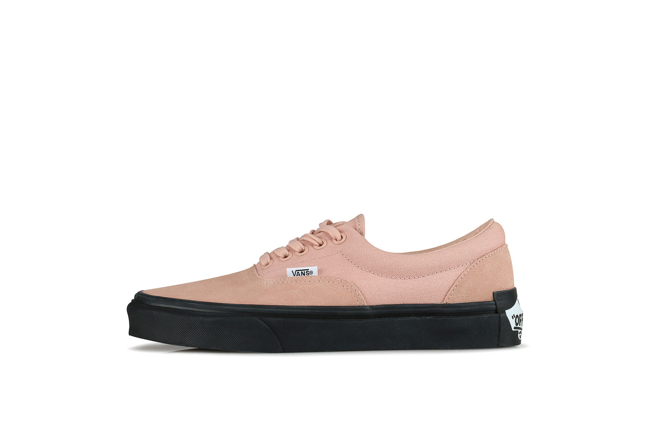 pink vans with black sole