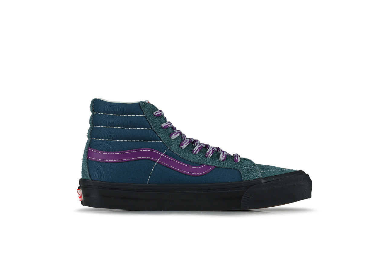 teal and purple vans