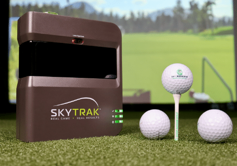 Skytrak Launch Monitor with golf ball and tee