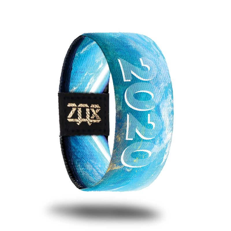 Product photo of the inside of 2020: blue toned design displaying the view of earth from outer space with '2020' text