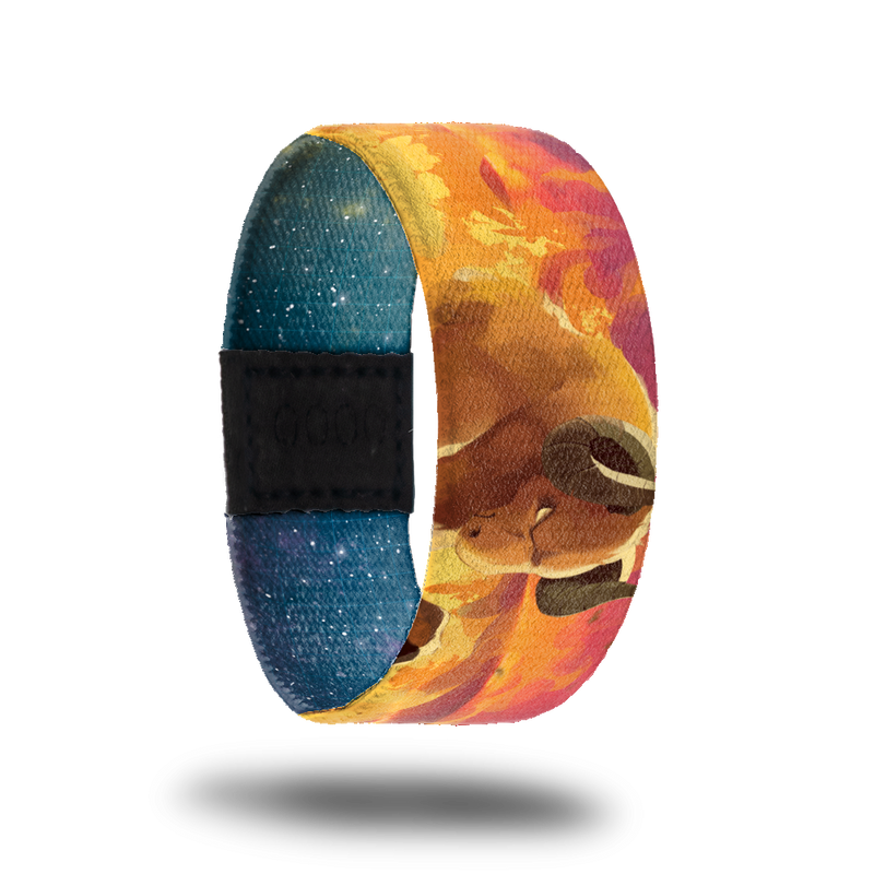Aries-Sold Out-ZOX - This item is sold out and will not be restocked. Outside is orange and yellow flames and has a mountain goat on it. Inside is blue with white stars all over and says Aries. 