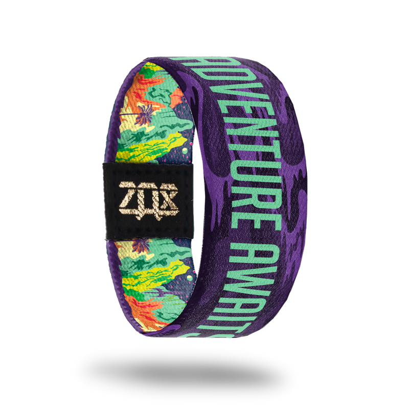 Adventure Awaits-Sold Out-ZOX - This item is sold out and will not be restocked. Purple base with orange, yellow and green beach scene. The inside is the same and says Adventure Awaits in teal. 