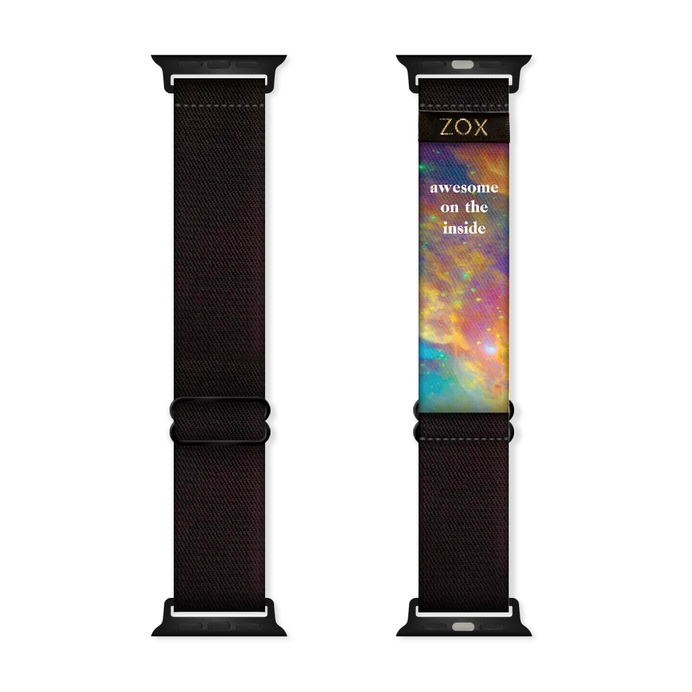 This is a watchband that is all black on the outside. The inside is half black and half multicolored space/galaxy themed.  Each watchband has a different pattern of colors and stars.  The inside also reads Awesome On The Inside. 