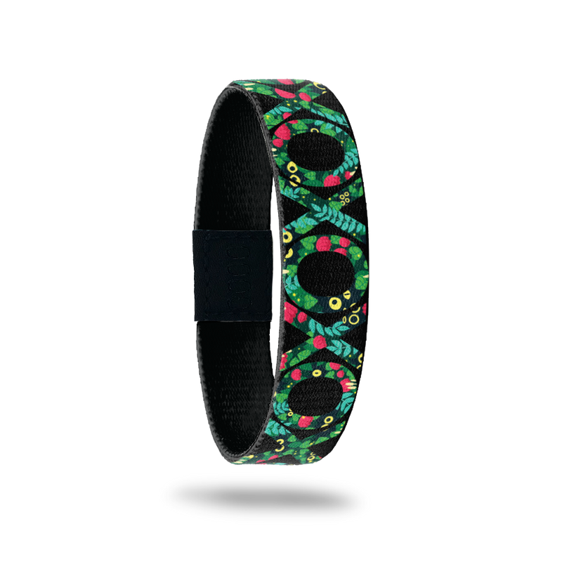 This is a reward item and not purchasable. It is a reversible single and is earned for having the blog subscription for 1 year+. The design is green, red and yellow hearts inside the letters of X and O around the entire ZOX. The inside reads F&F for Family & Friends. 