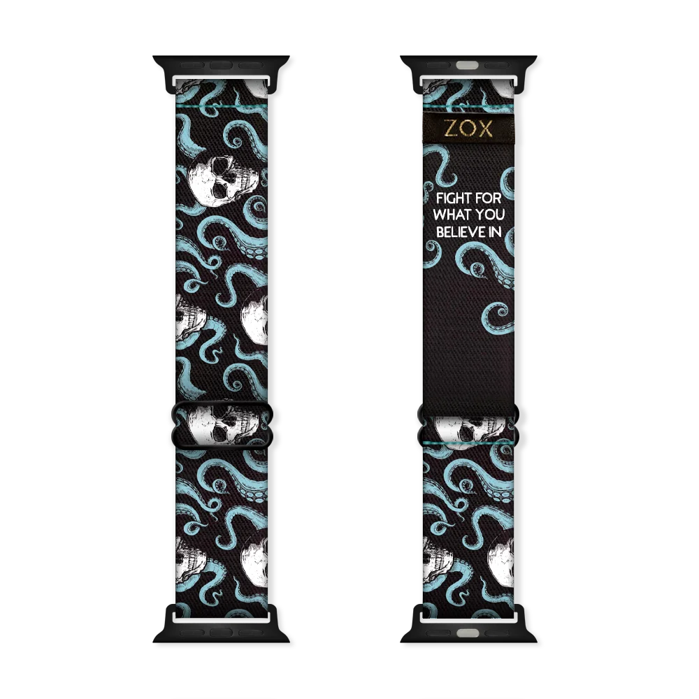 Watchband with black base and teal octopi all over. White skulls around the tentacles. Inside reads Fight For What You Believe In. Check size guide for compatible watches. 