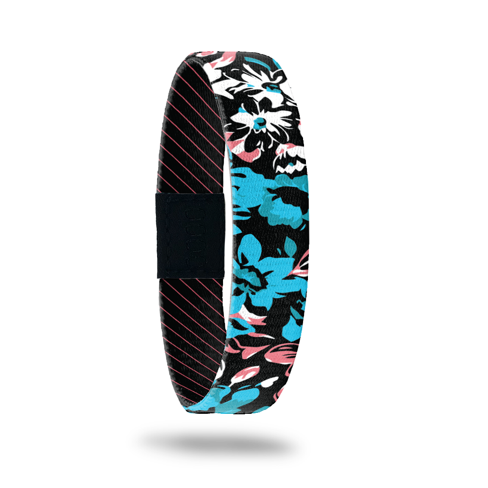Product photo of outside design of hang loose with neon tropical flower print overlaying black background