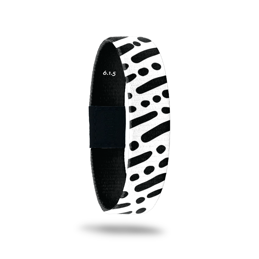 Wristband single is black and white lines and dots in a diagonal pattern. The inside is the same and reads I Am With You Always with the Bible verse 6.1.5.