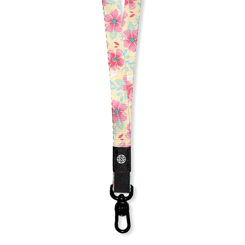Lanyard with pale yellow base and pink flowers all over. The Inside says I Choose Joy and the lanyard has a metal clip for keys/cards. Each lanyard comes with 2 clips if you need to make a breakaway lanyard. 