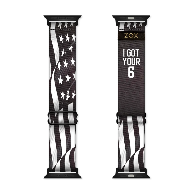 Watchband with a black base and an American flag in all white- stripes and stars. The inside is the same and says I Got Your Six. Check size guide for compatible watches. 