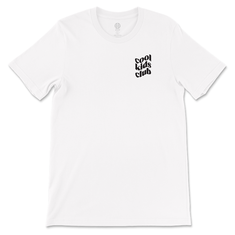 This is a white crew neck tshirt. The left chest reads Cool Kids Club in a wavy font and the back is a large smiley face in yellow. Around the face it reads It's Still Cool To Be Kind. 