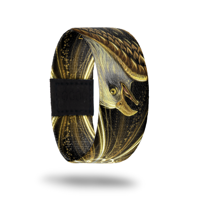 Outside design of Let Freedom Ring. Realistic drawn image of a bald eagle in the colors of white and gold with a gold and black background