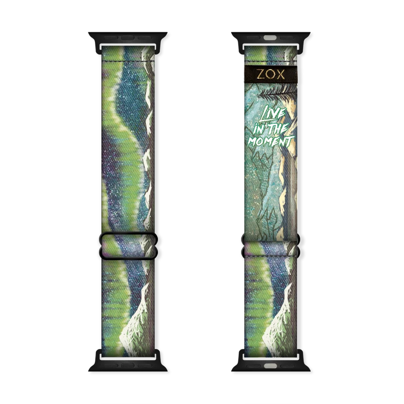 Watchband with a green and blue design of the NOrther Lights. Inside is the same and reads Live In The Moment. Check the size guide for applicable watches. 