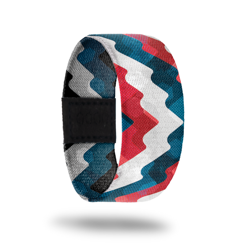 Outside design of Live Happily. Thick wave lines across the strap in red, white, and blue.