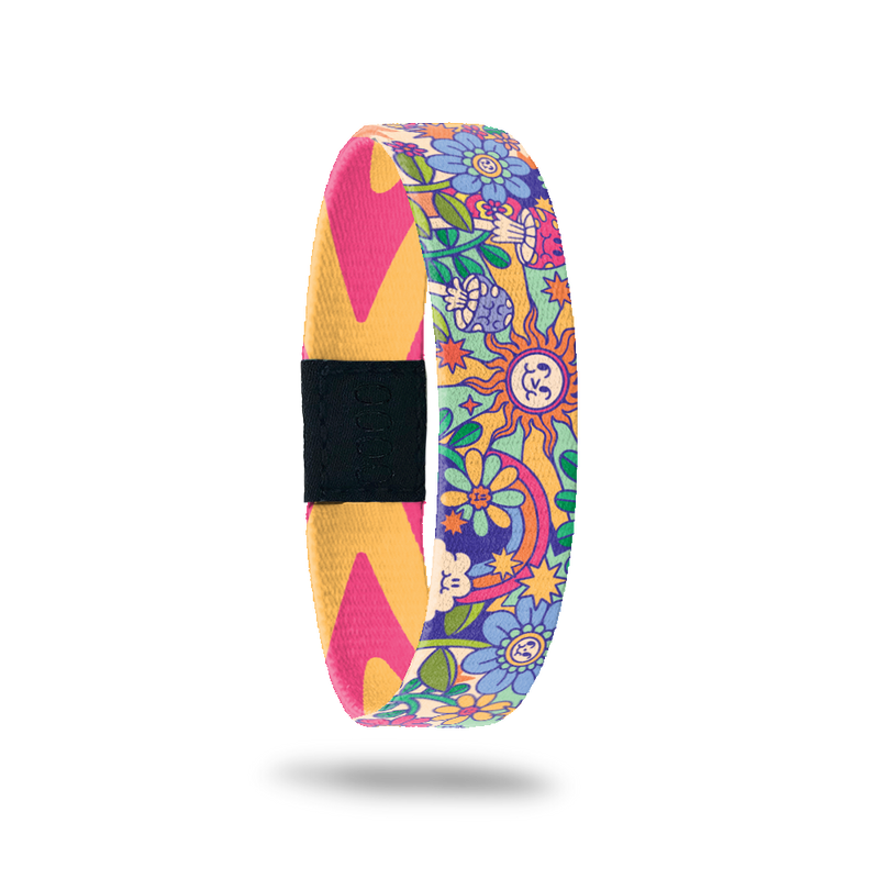 Wristband single with a very groovy, colorful, cartoon design. Lots of plants, flowers, smiling sun, mushrooms, clouds and rainbows all over. The inside is orange and blue geometric and says Look For Rainbows. This comes with a matching lapel pin and collector's box.  