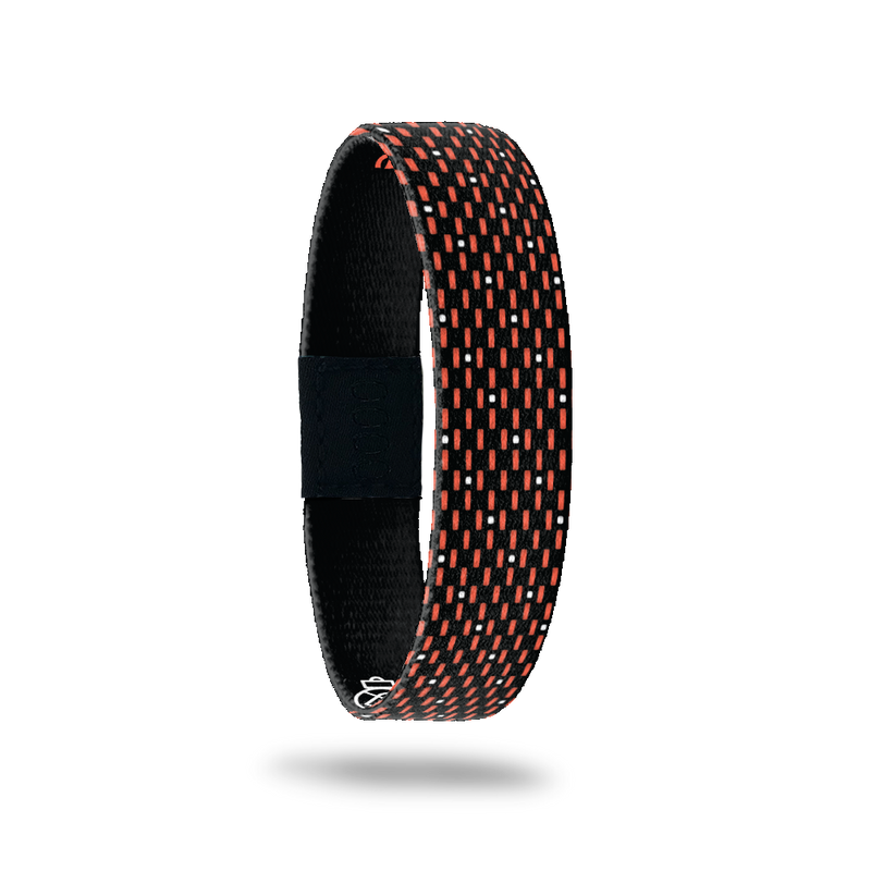 Outside Design of Make the Nevers Possible: black background with orange and white line and dot pattern