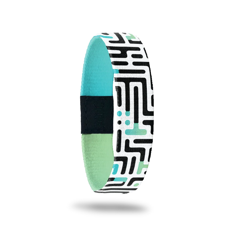 Wristband single. This design has an underlying green and teal gradient effect with black and white maze on top. The inside is the same gradient and reads Never Lose Hope.