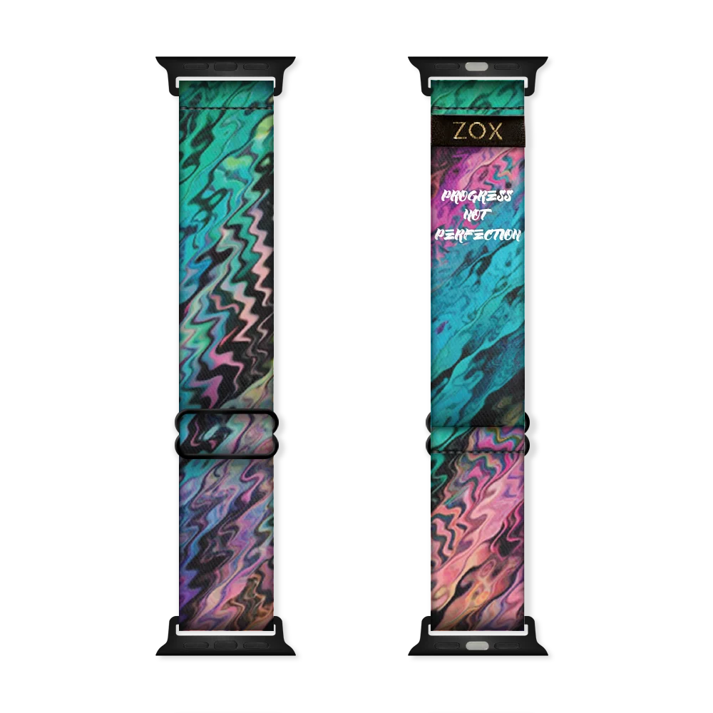 Wristband single with pink, purple, blue, teal, black and read abstract paint swirls. The inside is the same and reads Progress Not Perfection. Check out the size giude for compatible watches. 
