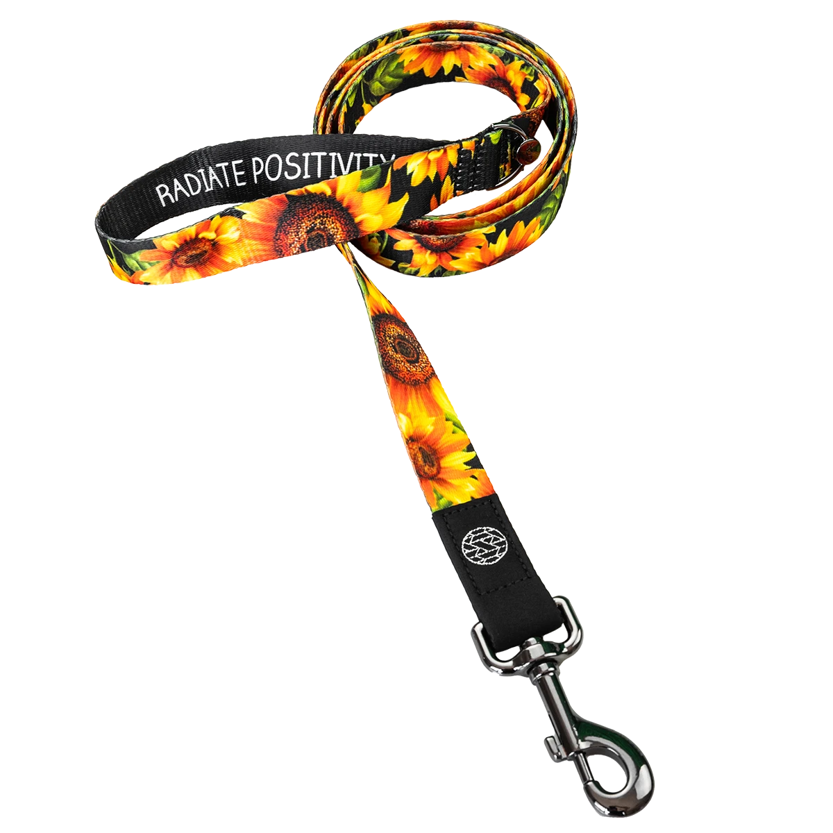 Dog Leash with black base and bright yellow sunflowers all over. The loop handle reads Radiate Positivity. Comes with a metal pull-hook clip. 