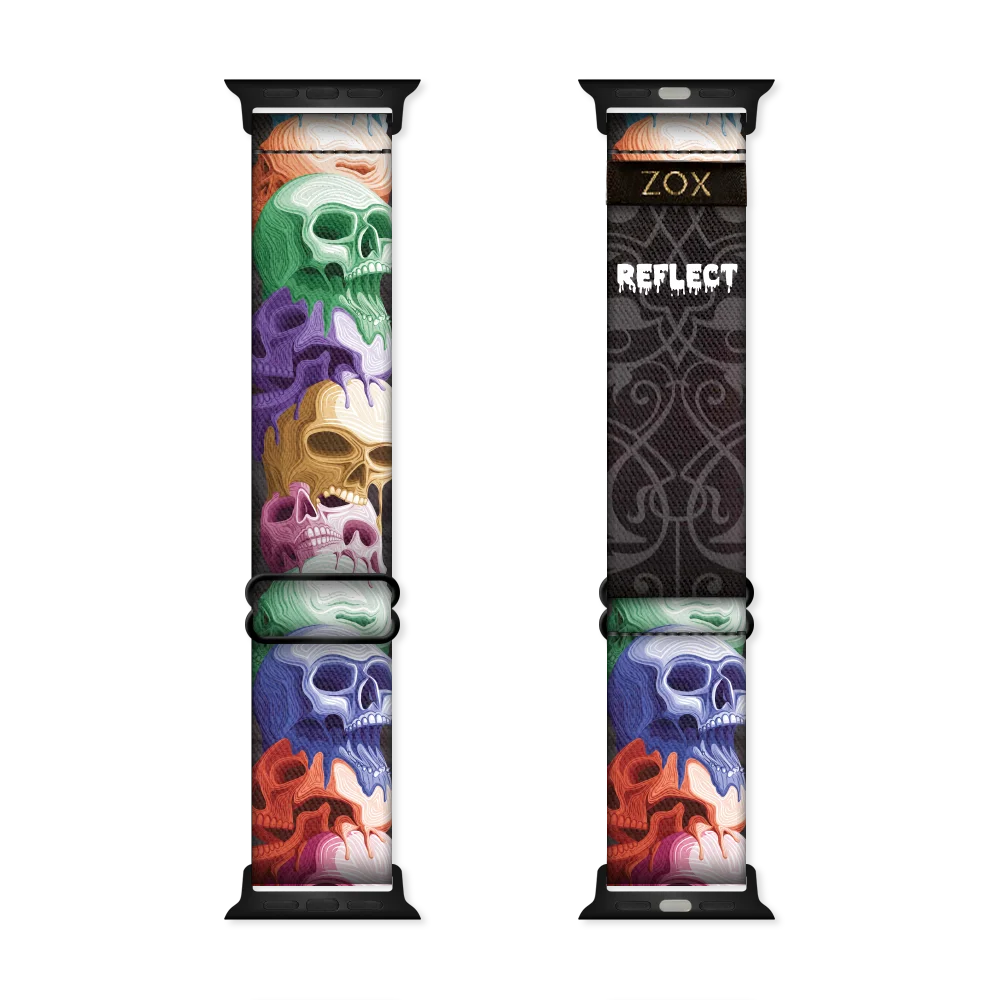Watchband with multicolored skulls all down the outside of the band. Inside is the same and says Reflect. 