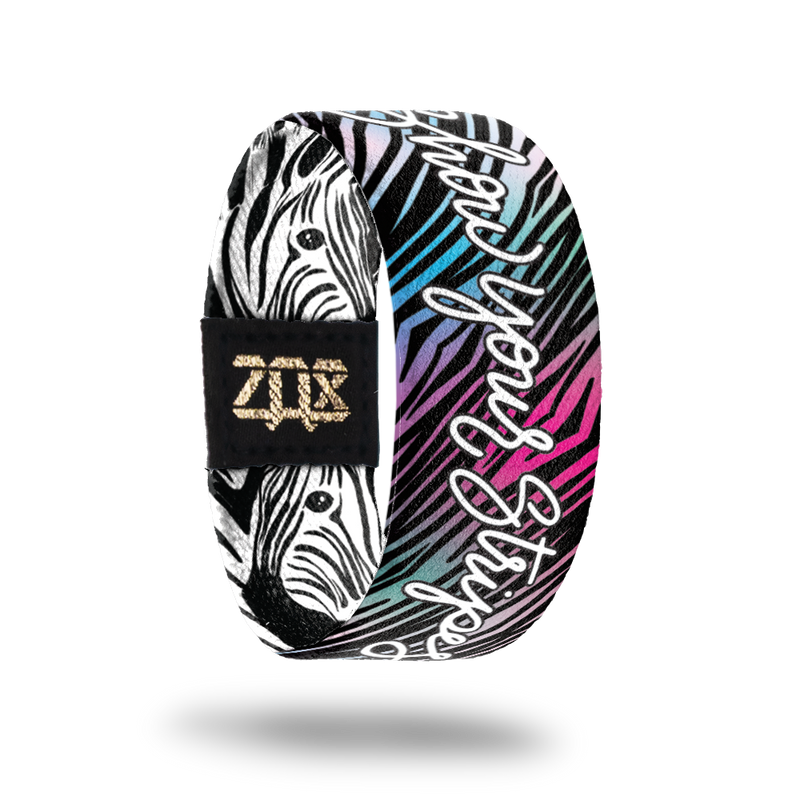 Inside desgin for Show Your Stripes. Colorful zebra pattern with blue, green, purple, and pink. Show Your Stripes centered in white text