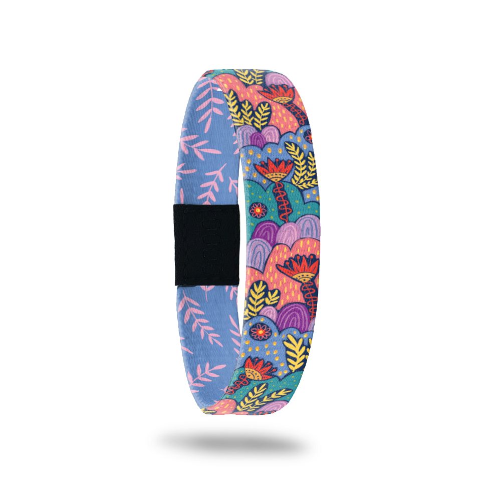 Product photo of the outside of You're Going To Be Okay. It is colorful botanical pattern on it, it is coral, purple, and turquoise with red and yellow accents.
