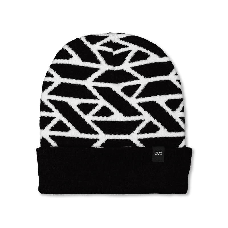 Knitted beanie which has a black and white geometric design onthe top. The band around the head is all black with the ZOX tag to the side. 
