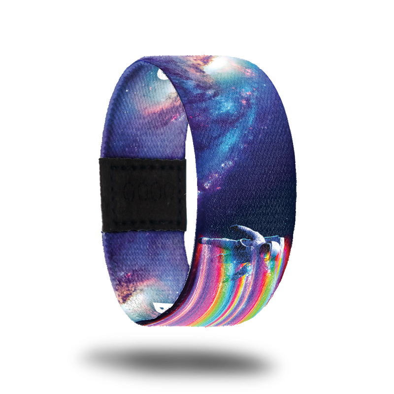 Outside Design of Be Kind to Your Mind: galaxy design with astronaut on one side of the strap that has rainbow lighting beaming from him