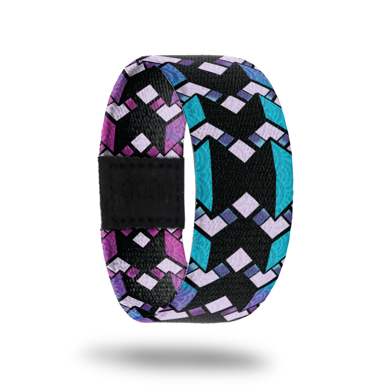 Between The Lines-Sold Out-ZOX - This item is sold out and will not be restocked. Solid black line in the middle with blue thin lines on the outside. Over top is zig zag purple designs. Inside is the same design but is purple and reads Between The Lines. 