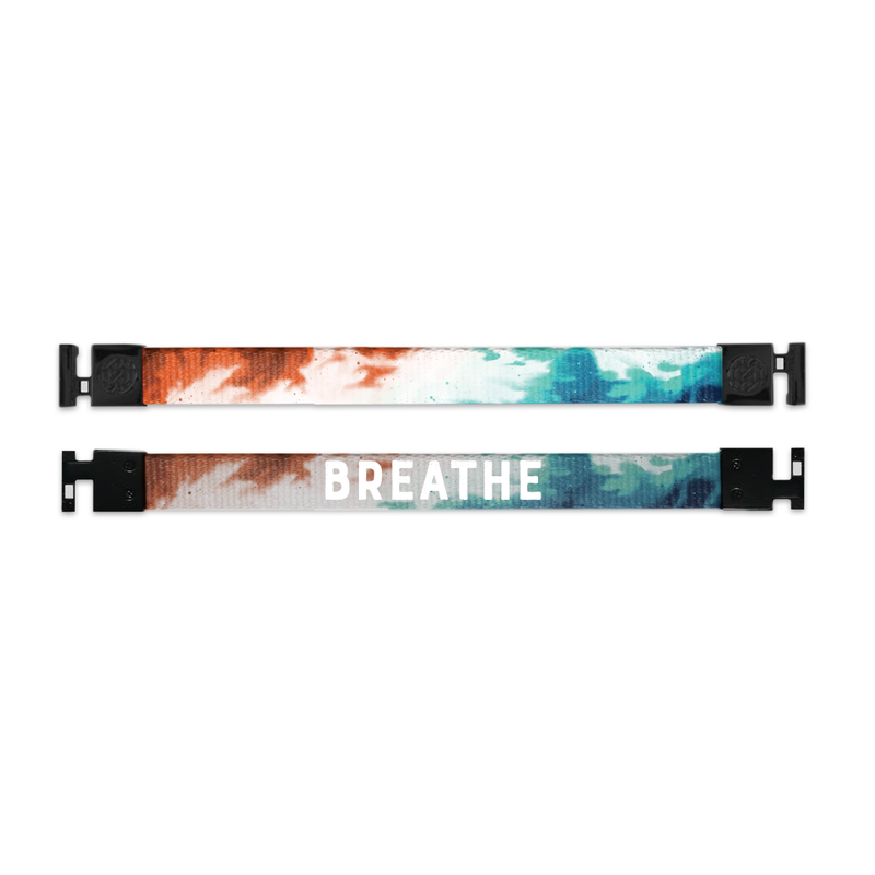 Shows outside and inside design for Breathe imperial with black aglet clasps. Top is outside design with blended colors of light red, white, and light blue. Bottom is the inside design of blended red, white, and blue with a transparent black layer over it with Breathe centered in white text