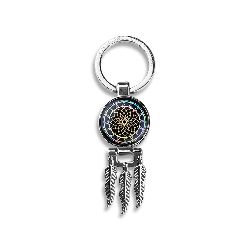 A round dreamcatcher keychain with dangling feathers (3) hanging from the bottom. Has a keyring and fits ZOX siingles. 
