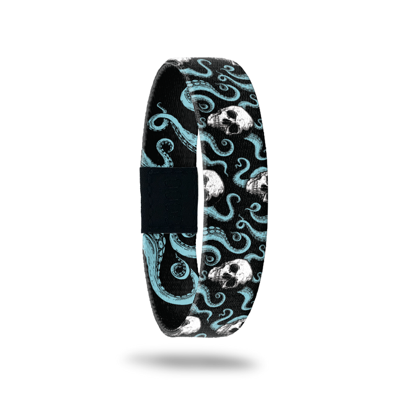Single wristband with black base and teal octopi all over. White skulls around the tentacles. Inside reads Fight For What You Believe In. 