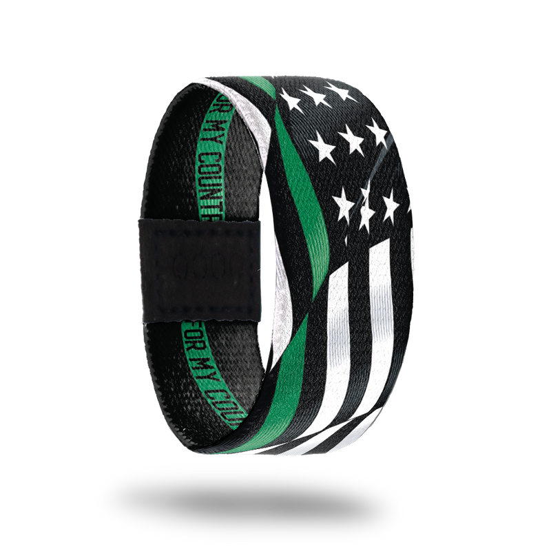 Outside Design of For My Country. wavy black and white United States flag with a line of green for one bottom stripe of the flag