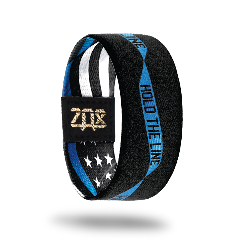 Inside Design of Hold The Line. black background with blue single ribbon running along the center with Hold The Line in the ribbon in black