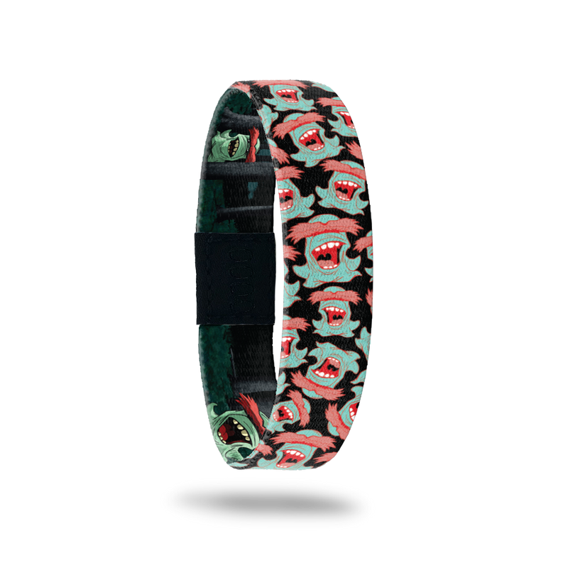 Product photo of the outside of 2020 - Day 11 - Mr. Uh Huh: black design with repeating mint green monster with red eyebrows