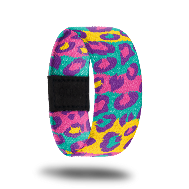 Outside design for My Best Self. Multi-colored spotted cheetah print in teal, yellow, pink, and purple. 