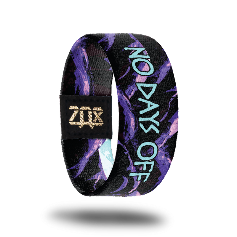 Inside Design of No Days Off: black and purple mountains with a centered blue text ‘No Days Off’
