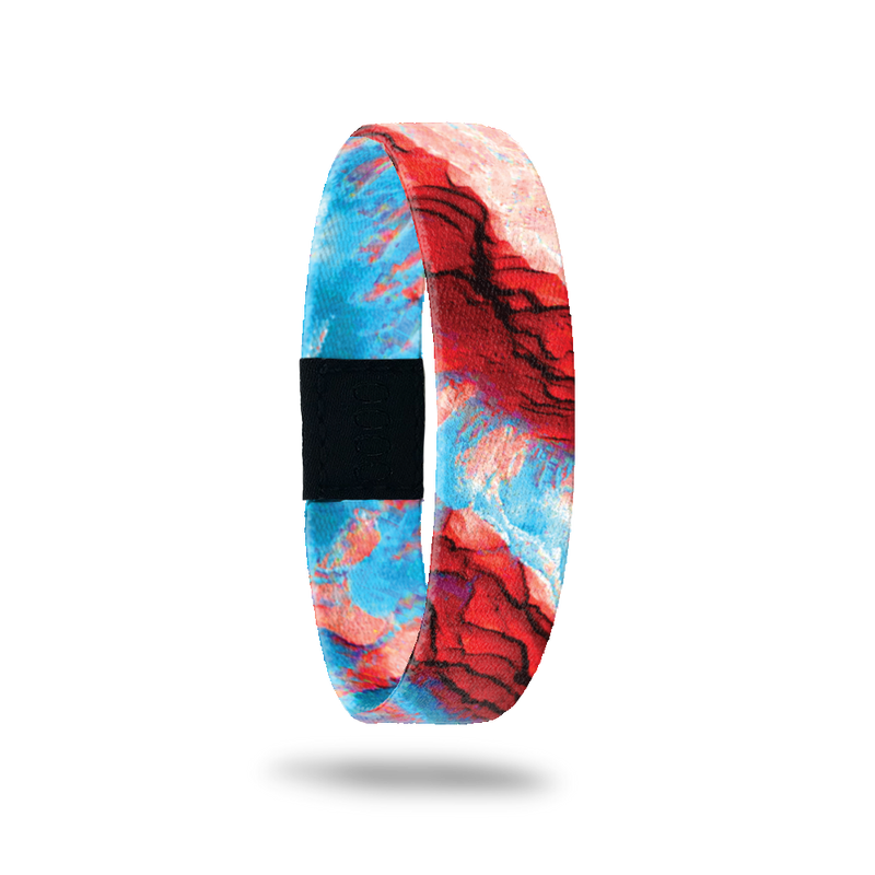 Product photo of the outside of one step at a time. It is an aerial of photoshopped image of Mars that is dark red and light blue.